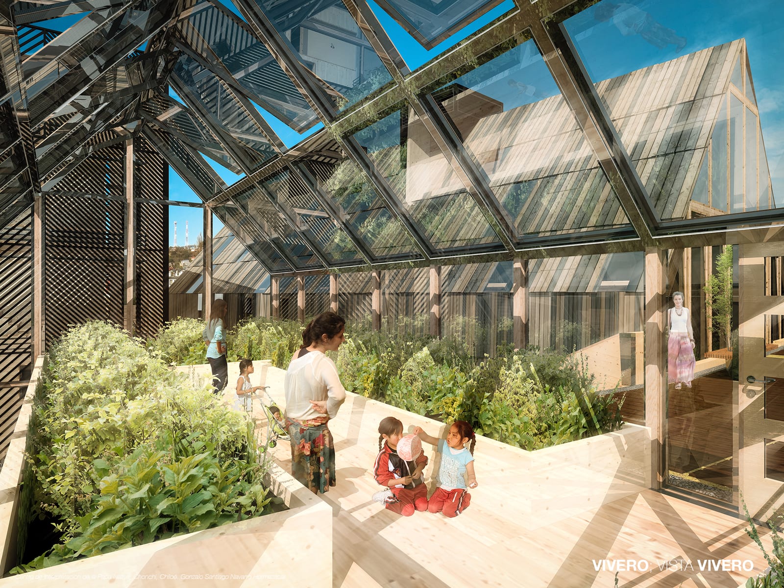 Interior of the greenhouse with sloped glass roof, plants growing in beds and visitors moving through the space